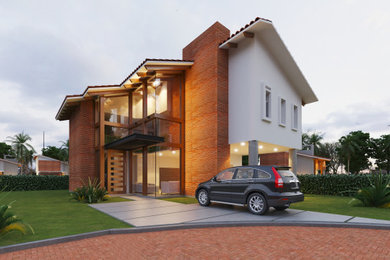 Mid-sized two-story exterior home photo in Other