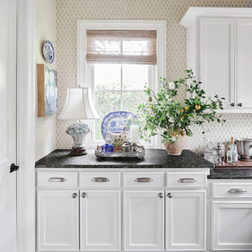 off white painted kitchen cabinets & updated wallpapered spaces