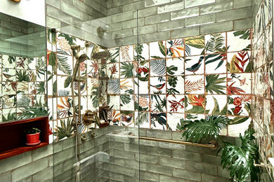 Example of a small island style green tile and ceramic tile pebble tile floor, multicolored floor and single-sink bathroom design in DC Metro with a one-piece toilet, an undermount sink, quartzite countertops, white countertops, a niche and a freestanding vanity