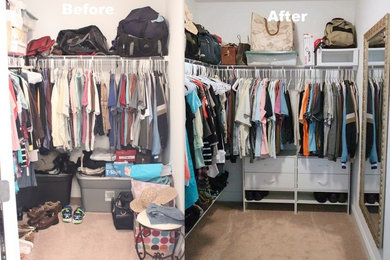 Inspiration for a mid-sized transitional gender-neutral carpeted walk-in closet remodel in Other with flat-panel cabinets and white cabinets