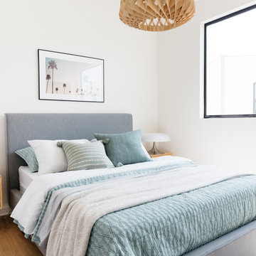 Ocean Blue Tones and Wood Pendant in Modern Bedroom