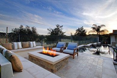 Inspiration for a backyard pool remodel in Orange County