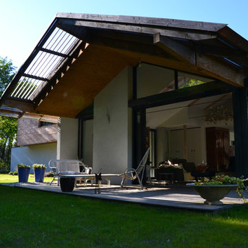 toit en porte à faux sur terrasse sud