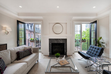 Living room - transitional open concept light wood floor and tray ceiling living room idea in Boston with white walls, a standard fireplace and a stone fireplace