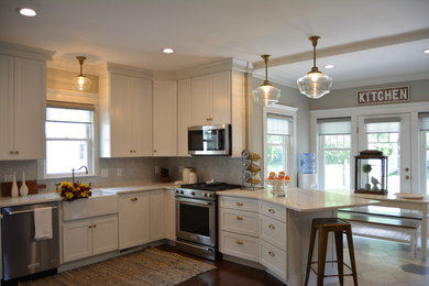 Example of a transitional kitchen design in New York