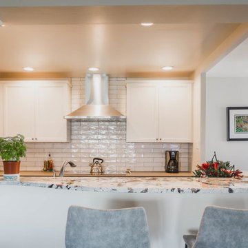 Open Kitchen with Reconfigured Layout & Peninsula Seating