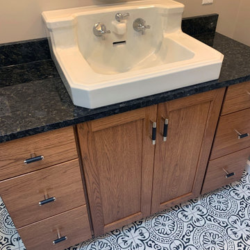 Black & white patterned tile bathroom
