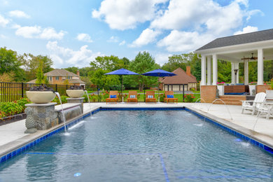 Inspiration for a backyard rectangular pool fountain remodel in Other