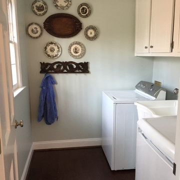 laundry space and cabinet