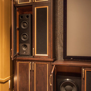 Inspiration for a large transitional enclosed carpeted and brown floor home theater remodel in Atlanta with gray walls and a projector screen