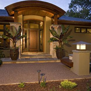 Inredning av ett modernt stort grönt hus, med allt i ett plan och stuckatur