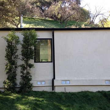 Modern Home with 3" Black Smooth Gutter System