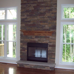 Stone Wall with Fireplace - Indoor Fireplaces