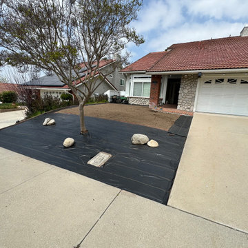 New landscaping , drought tolerant plants ,drip  and decorative pots
