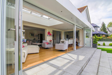 Design ideas for a contemporary home design in Surrey.