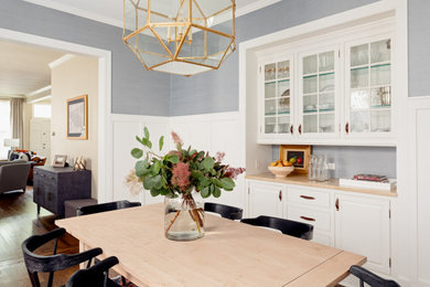 Example of a transitional dining room design in Boise