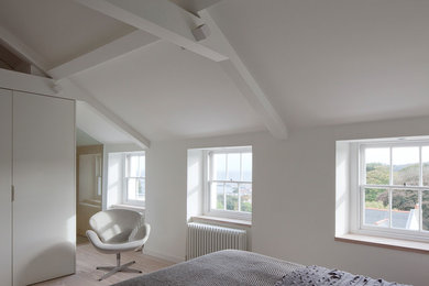 Trendy bedroom photo in Channel Islands