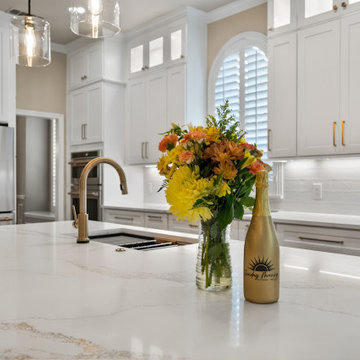 Close-Up View of Calacatta Gold Quartz Kitchen Island Countertop with Undermount