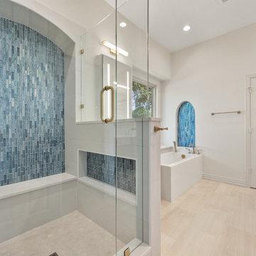 Full View of Walk-In Glass Shower with Blue Glass Mosaic Tile Feature Wall and W
