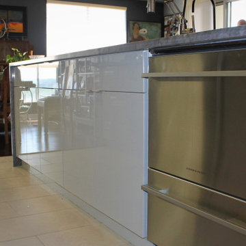 Contemporary high gloss kitchen in downtown luxury condo