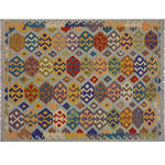 Bareens Designer Rugs - Rustic Turkish Kilim Anya Hand-Woven Wool Rug - 5'3'' x 6'5'' - Elevate the elegance of your home with this stunning hand-woven tribal Kilim wool rug. Meticulously crafted on a loom by the Nomad Turkman people using hand-spun wool and 100% natural vegetable dyes, these rugs are recognized for their repetitive geometric patterns, incorporating naturalistic floral and traditional designs. The contemporary fashion palette results in bold, sharp patterns that are incredibly versatile, as the pattern is the same on both sides. These reversible rugs feature a lighter shade on one side and brighter colors on the other, providing versatility according to preference. These unique rugs are made by knotting short strands of different colors onto the warps and securing them by tightly pressing the wefts. The designs are created by interweaving the various colored wefts and warps. Kilims are known for their exceptional durability and versatility, making them truly unique rugs.  Product Details    Rug Size: 5'3'' x 6'5''  Material: 100% Wool  Style: Kilim, Flat Weave, Dhurrie, Turkish, Southwestern, Rustic, Tribal  Colors: Grey, Blue, Brown, Beige  Weave Type: Hand-Woven, Handmade  Pile Height: Less than 0.25 inch