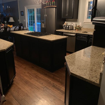 cabinet refacing-----black cabinets with granite