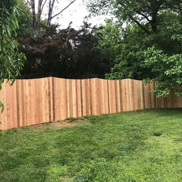 Western Red Cedar Spaced picket fence with French gothic posts and Concave Top