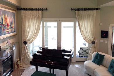 Example of a mid-sized transitional enclosed living room design in Raleigh with a music area and a standard fireplace