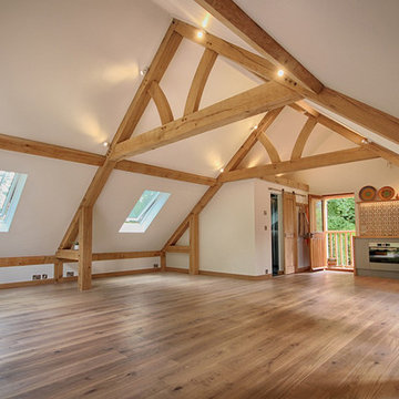 Grand oak framed room above garage interior