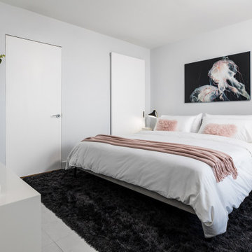 Downtown Miami Bedroom Remodel with Frameless Doors and Custom Closet Storage
