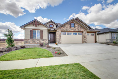Mid-sized transitional beige one-story mixed siding gable roof photo in Boise