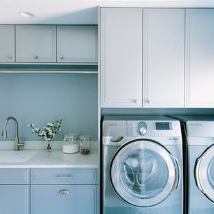 Design ideas for a traditional utility room in Portland Maine with recycled glass countertops, porcelain flooring and grey cabinets.