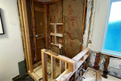 Bathroom - mid-sized modern master white tile and porcelain tile vinyl floor and double-sink bathroom idea in Seattle with white cabinets, a vessel sink, wood countertops and a hinged shower door