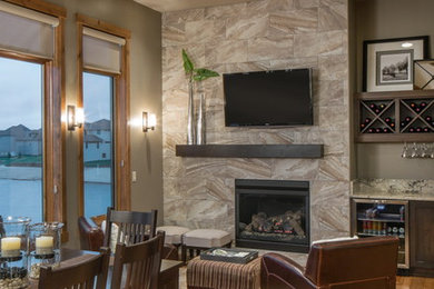 Example of a transitional living room design in Omaha