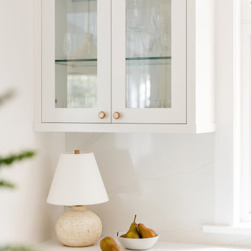 Glass-Front Cabinetry with Warm Brass Hardware – Modern Heritage Kitchen, Victor