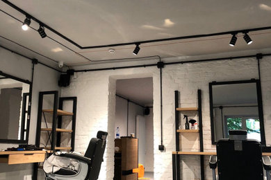 Inspiration for a mid-sized industrial home design remodel in Other