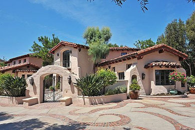 Example of a tuscan exterior home design in Other