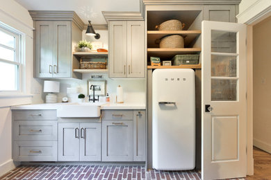 Transitional laundry room photo in Salt Lake City
