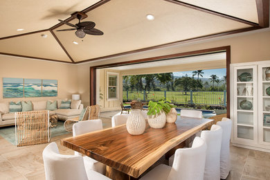 Example of a beach style home design design in Hawaii
