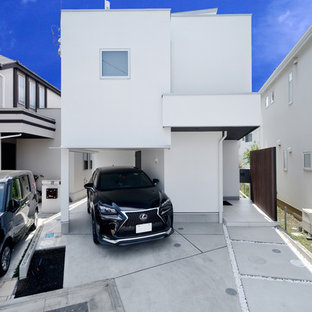 東京都下のモダンスタイルのおしゃれな家の外観 (陸屋根、戸建、金属屋根) の写真