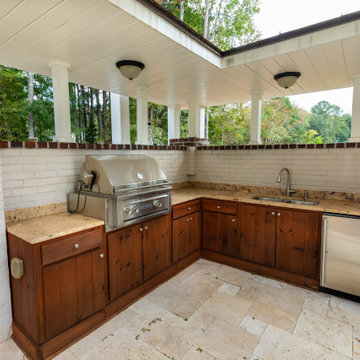 Covered Outdoor Kitchen with Wood Cabinetry
