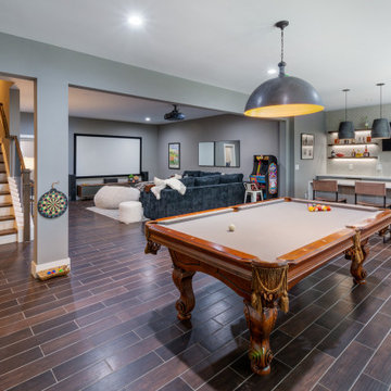 GOLF SIMULATOR, WINE CELLAR, AND BASEMENT BAR