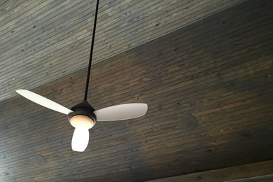 Patio speakers blended with wood ceiling