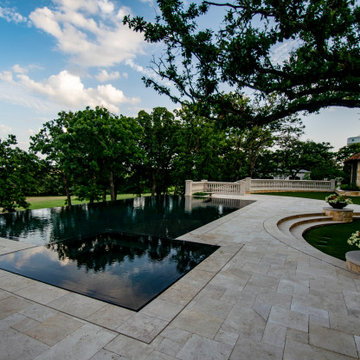 Southlake Reflective Vanishing Edge Pool with Perimeter Overflow Spa