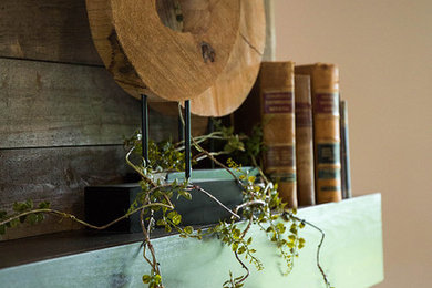 Inspiration for a mid-sized cottage formal and open concept living room remodel in Other with brown walls, a standard fireplace, a stone fireplace and no tv