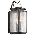 Kichler - Outdoor Wall 3-Light - You'll love the traditional elements of this 3 light outdoor wall fixture from the Manningham collection. The Clear Seedy glass partners with the strong lines and detailed cap accents in Olde Bronze creating a colonial inspired illuminating dream for the outside of your home.