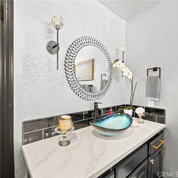 Stylish Powder Room with Vessel Sink