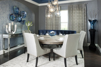 Inspiration for a mid-sized contemporary dark wood floor enclosed dining room remodel in Dallas with gray walls and no fireplace