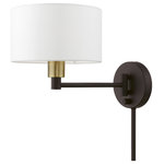 Livex Lighting - 1 Light Bronze with Antique Brass Accent Swing Arm Wall Lamp - Add this versatile swing arm wall lamp bedside or above a favorite reading chair to enjoy more light where you need it. The bronze finish with antique brass finish accent is transitional while the off-white fabric shade offers subtle texture.