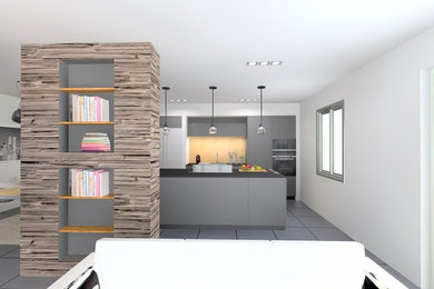 Une cuisine moderne SieMatic dans une air ouverte sur le salon, un esprit Loft.
